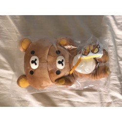 탈을 쓴 리락쿠마 인형